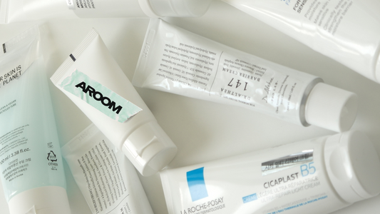 Multiple face creams, brand logo AROOM